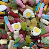 Takeaway box filled with at least fifteen varieties of confectionery.